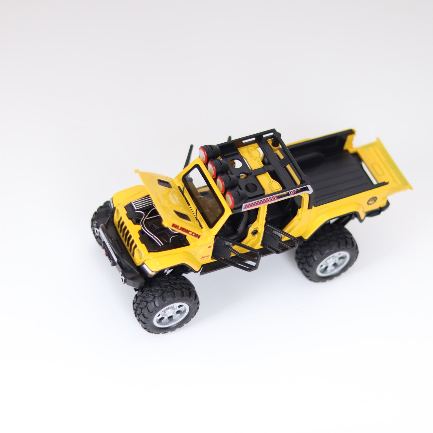 Jeep Wrangler Rubicon 1:26 Scale Die cast Metal Pullback Toy car with Openable Doors & Light(Yellow)